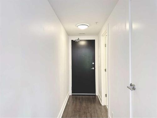 321-619 Confluence Way Se, Calgary, AB - Indoor Photo Showing Other Room