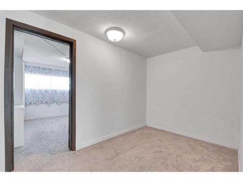 110 Hunterbrook Place Nw, Calgary, AB - Indoor Photo Showing Other Room