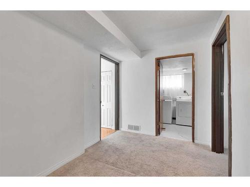 110 Hunterbrook Place Nw, Calgary, AB - Indoor Photo Showing Other Room