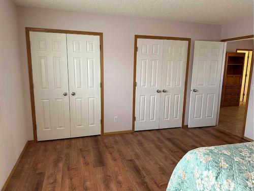 166 Cimarron Park Circle, Okotoks, AB - Indoor Photo Showing Bedroom