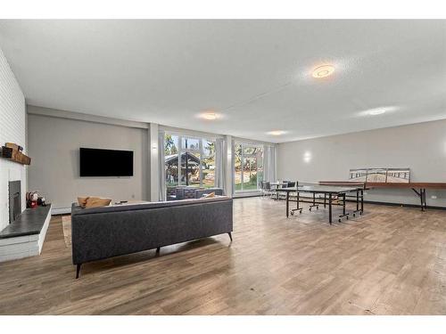 378-1620 8 Avenue Nw, Calgary, AB - Indoor Photo Showing Living Room With Fireplace