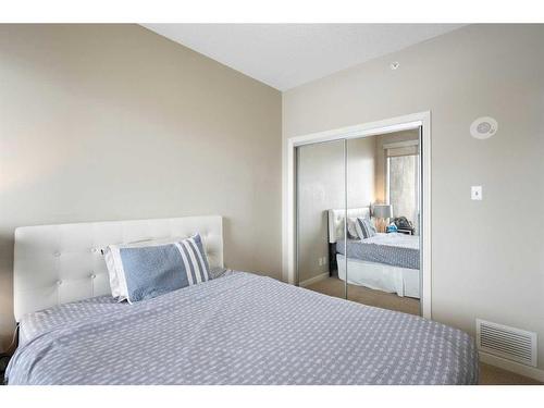 806-1320 1 Street Se, Calgary, AB - Indoor Photo Showing Bedroom