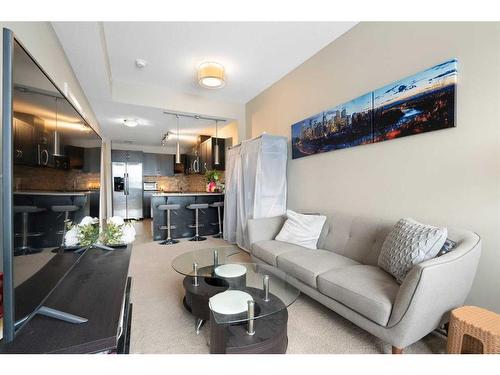 806-1320 1 Street Se, Calgary, AB - Indoor Photo Showing Living Room With Fireplace