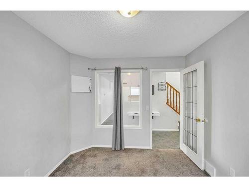 256 Oakmere Place, Chestermere, AB - Indoor Photo Showing Other Room