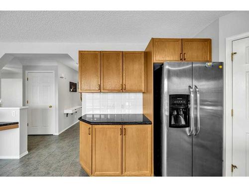 256 Oakmere Place, Chestermere, AB - Indoor Photo Showing Kitchen