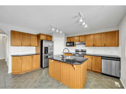 256 Oakmere Place, Chestermere, AB - Indoor Photo Showing Kitchen