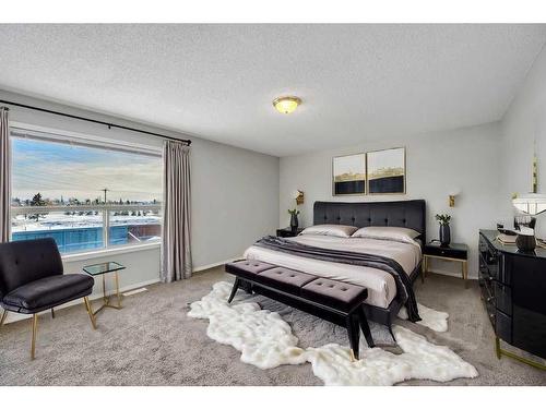 256 Oakmere Place, Chestermere, AB - Indoor Photo Showing Bedroom