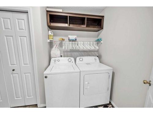 256 Oakmere Place, Chestermere, AB - Indoor Photo Showing Laundry Room