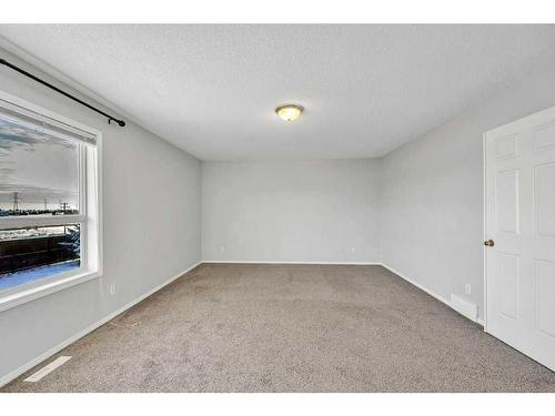 256 Oakmere Place, Chestermere, AB - Indoor Photo Showing Other Room