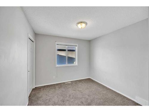 256 Oakmere Place, Chestermere, AB - Indoor Photo Showing Other Room