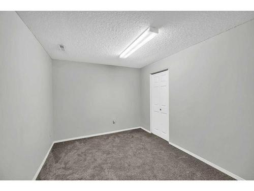 256 Oakmere Place, Chestermere, AB - Indoor Photo Showing Other Room