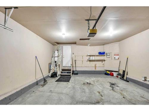 256 Oakmere Place, Chestermere, AB - Indoor Photo Showing Garage