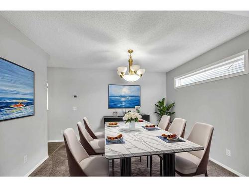 256 Oakmere Place, Chestermere, AB - Indoor Photo Showing Dining Room