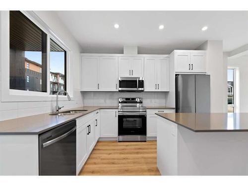 45 Lucas Way Nw, Calgary, AB - Indoor Photo Showing Kitchen With Upgraded Kitchen