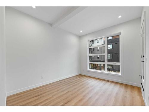 45 Lucas Way Nw, Calgary, AB - Indoor Photo Showing Other Room