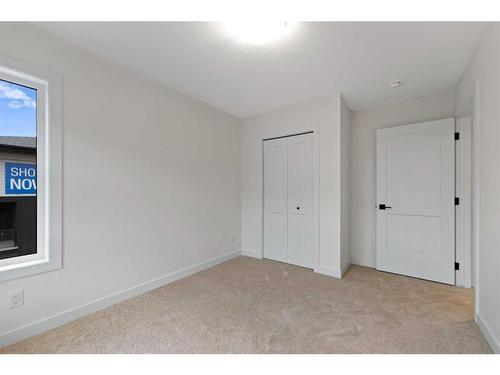 45 Lucas Way Nw, Calgary, AB - Indoor Photo Showing Other Room