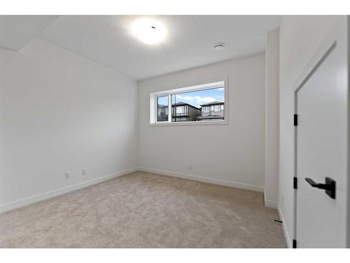 45 Lucas Way Nw, Calgary, AB - Indoor Photo Showing Other Room