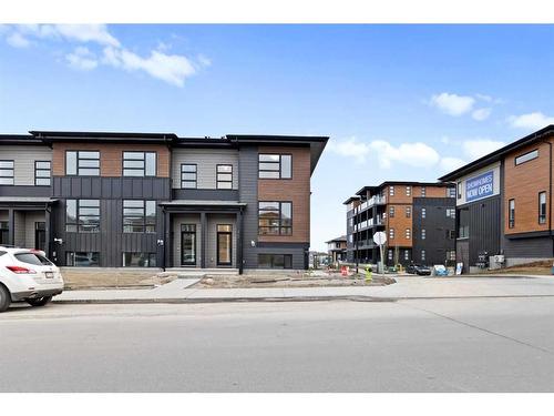 45 Lucas Way Nw, Calgary, AB - Outdoor With Balcony With Facade