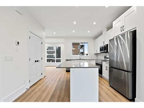 45 Lucas Way Nw, Calgary, AB - Indoor Photo Showing Kitchen With Upgraded Kitchen