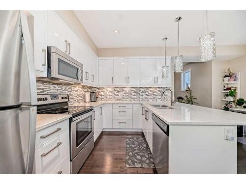 4 Quarry Lane Se, Calgary, AB - Indoor Photo Showing Kitchen With Stainless Steel Kitchen With Upgraded Kitchen