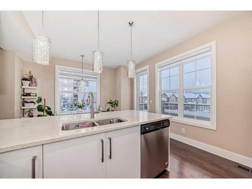 4 Quarry Lane Se, Calgary, AB - Indoor Photo Showing Kitchen With Double Sink