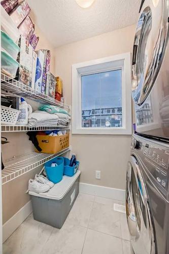 4 Quarry Lane Se, Calgary, AB - Indoor Photo Showing Laundry Room