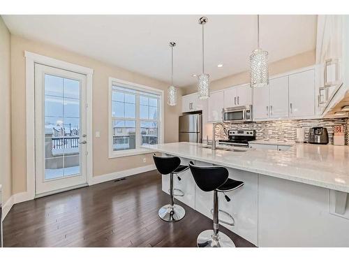 4 Quarry Lane Se, Calgary, AB - Indoor Photo Showing Kitchen With Upgraded Kitchen