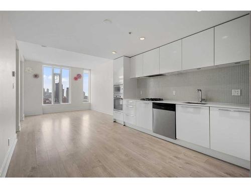 2607-901 10 Avenue Sw, Calgary, AB - Indoor Photo Showing Kitchen With Upgraded Kitchen