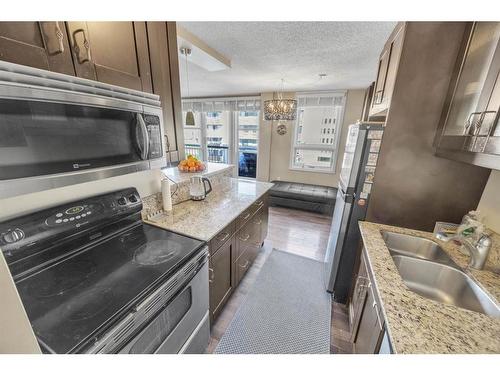 703-733 14 Avenue Sw, Calgary, AB - Indoor Photo Showing Kitchen With Double Sink