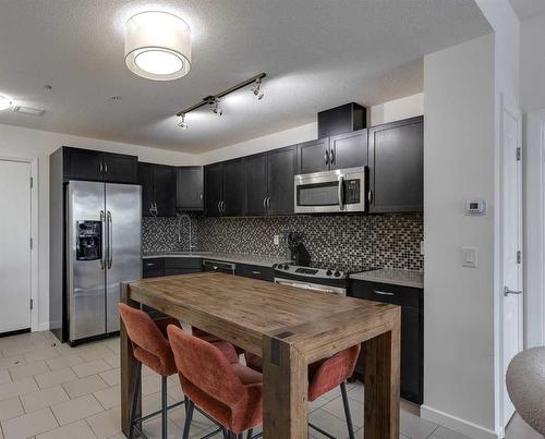 1008-1320 1 Street Se, Calgary, AB - Indoor Photo Showing Kitchen With Stainless Steel Kitchen