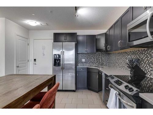 1008-1320 1 Street Se, Calgary, AB - Indoor Photo Showing Kitchen With Stainless Steel Kitchen