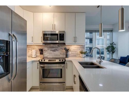 1709-1320 1 Street Se, Calgary, AB - Indoor Photo Showing Kitchen With Stainless Steel Kitchen With Double Sink With Upgraded Kitchen