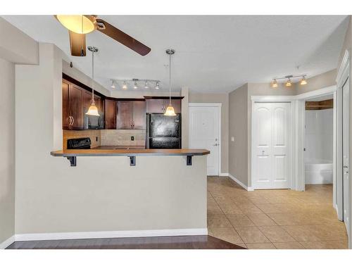 1310-175 Panatella Hill Nw, Calgary, AB - Indoor Photo Showing Kitchen