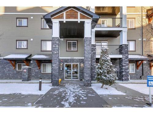 1310-175 Panatella Hill Nw, Calgary, AB - Outdoor With Balcony With Facade