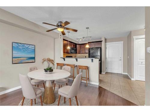 1310-175 Panatella Hill Nw, Calgary, AB - Indoor Photo Showing Dining Room