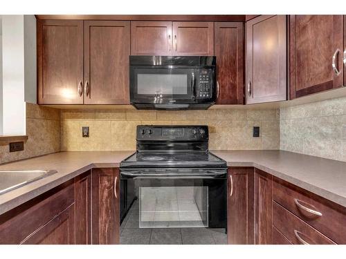 1310-175 Panatella Hill Nw, Calgary, AB - Indoor Photo Showing Kitchen