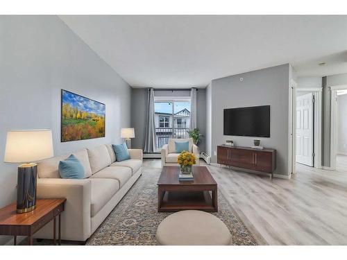 307-3 Somervale View Sw, Calgary, AB - Indoor Photo Showing Living Room