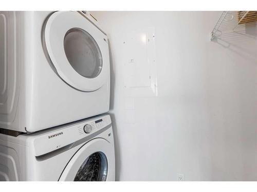 210-30 Sage Hill Walk Nw, Calgary, AB - Indoor Photo Showing Laundry Room