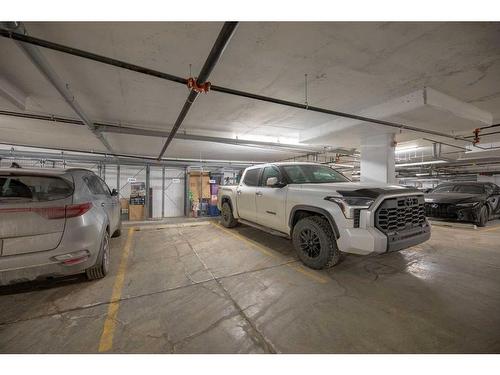 210-30 Sage Hill Walk Nw, Calgary, AB - Indoor Photo Showing Garage