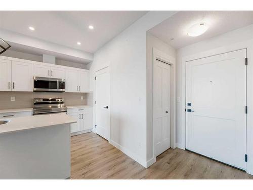 210-30 Sage Hill Walk Nw, Calgary, AB - Indoor Photo Showing Kitchen