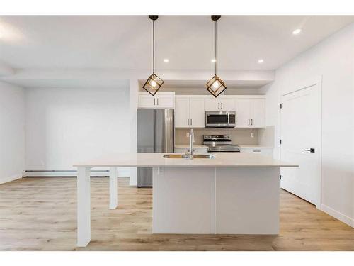 210-30 Sage Hill Walk Nw, Calgary, AB - Indoor Photo Showing Kitchen With Upgraded Kitchen