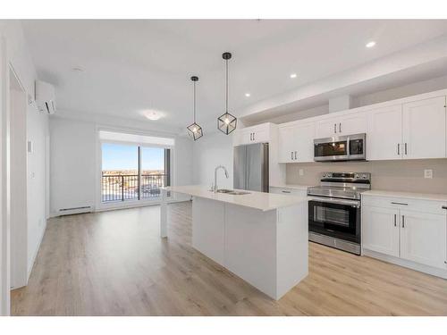 210-30 Sage Hill Walk Nw, Calgary, AB - Indoor Photo Showing Kitchen With Upgraded Kitchen