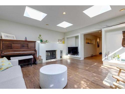 507 Brunswick Avenue Sw, Calgary, AB - Indoor Photo Showing Living Room With Fireplace