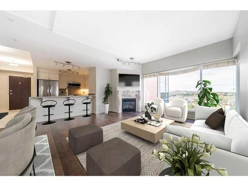 2105-920 5 Avenue Sw, Calgary, AB - Indoor Photo Showing Living Room With Fireplace