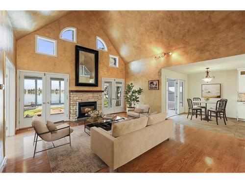 765 East Chestermere Drive, Chestermere, AB - Indoor Photo Showing Living Room With Fireplace