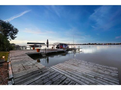 765 East Chestermere Drive, Chestermere, AB - Outdoor With Body Of Water With Deck Patio Veranda With View