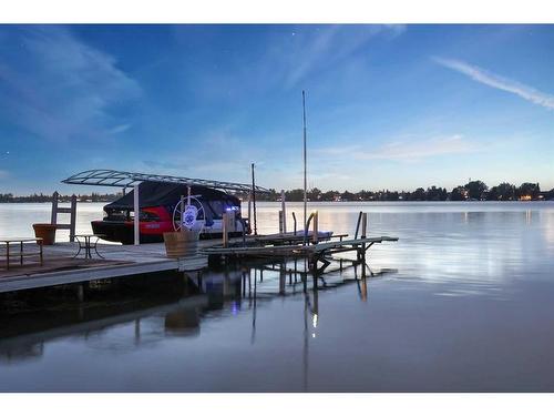 765 East Chestermere Drive, Chestermere, AB - Outdoor With Body Of Water With Deck Patio Veranda With View