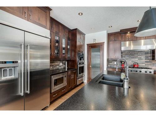 221 Tuscany Estates Rise Nw, Calgary, AB - Indoor Photo Showing Kitchen With Double Sink With Upgraded Kitchen