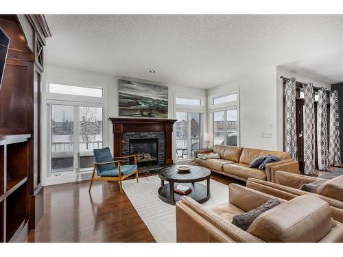 221 Tuscany Estates Rise Nw, Calgary, AB - Indoor Photo Showing Living Room With Fireplace