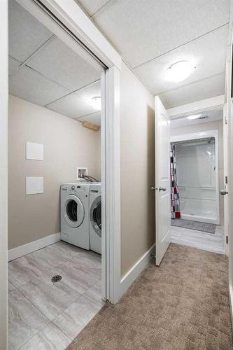 78 Gainsborough Drive Sw, Calgary, AB - Indoor Photo Showing Laundry Room